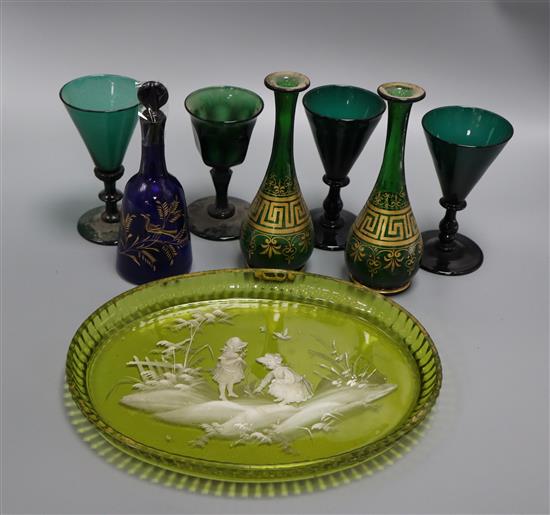 A pair of gilded green glass posy vases, four green wine glasses and two other items